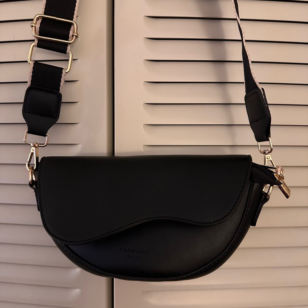 Women’s Black Vegan Leather Saddle Crossbody Bag  with a guitar strap